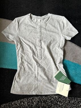 Gray Henley style top.